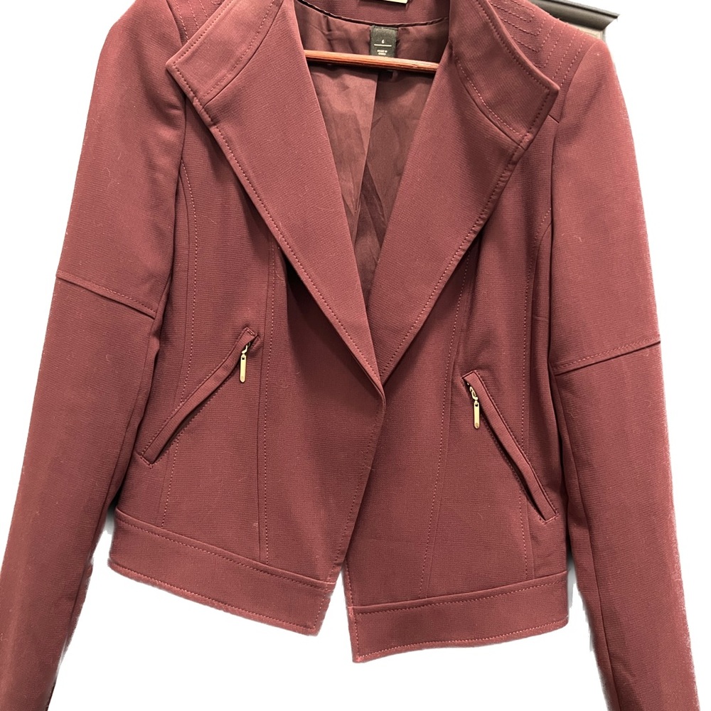 WHBM Burgundy jacket with zipper pockets.